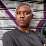 Okey Ndibe’s Airport Interrogation: MOCODE Decries Harassment of Journalists, Says Criticism Strengthens Democracy